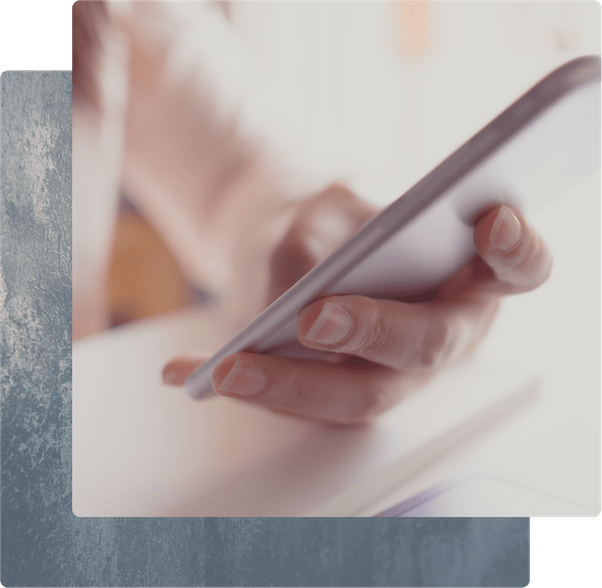 Up close of woman's hand holding smart phone.